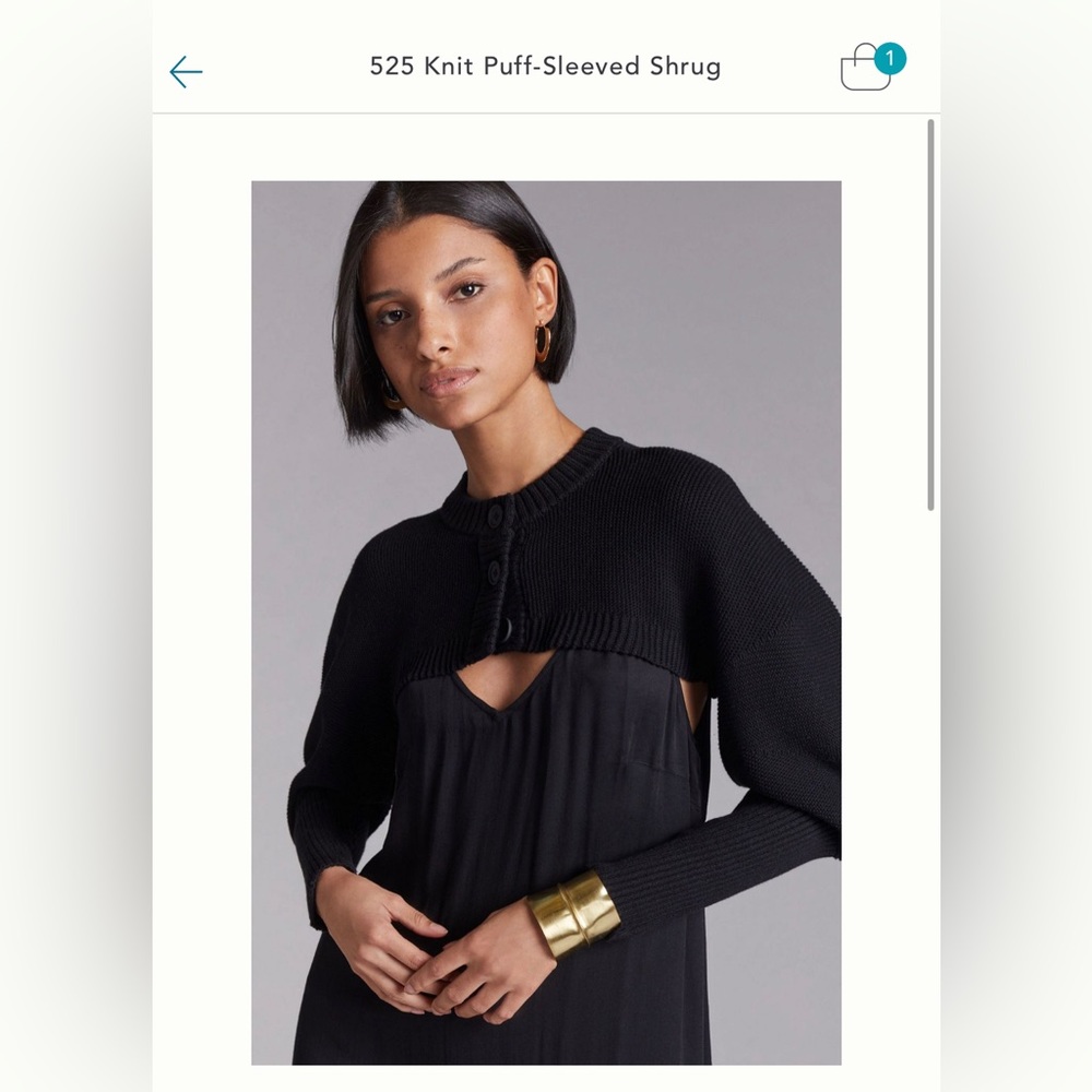 New 525 sweater, modern shrug style. Nice topper on cami and strapless pieces